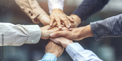 Together we can do great things. Cropped shot of a group of businesspeople piling their hands on top of each other Business team shaking hands of unity after a meeting to sign agreement.