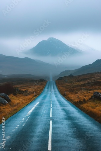 Mysterious Road Leading into Mountain Fog