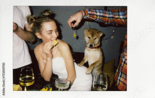 Moment at the party with funny dog photo