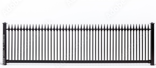 A sturdy black metal fence panel, showcasing its intricate texture, stands out against a white isolated background. The fence provides construction security with its metal industry plate shape.