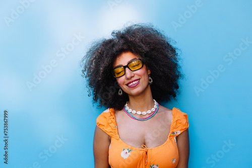 Cheerful Egyptian woman in sunglasses photo