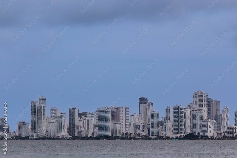 Fototapeta premium Cartagena's buildings seen from afar, allowing to appreciate its great and beautiful sea.