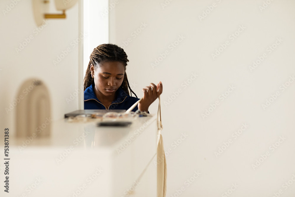 Woman Preparing to Leave Apartment Woman Preparing to Leave Apartment