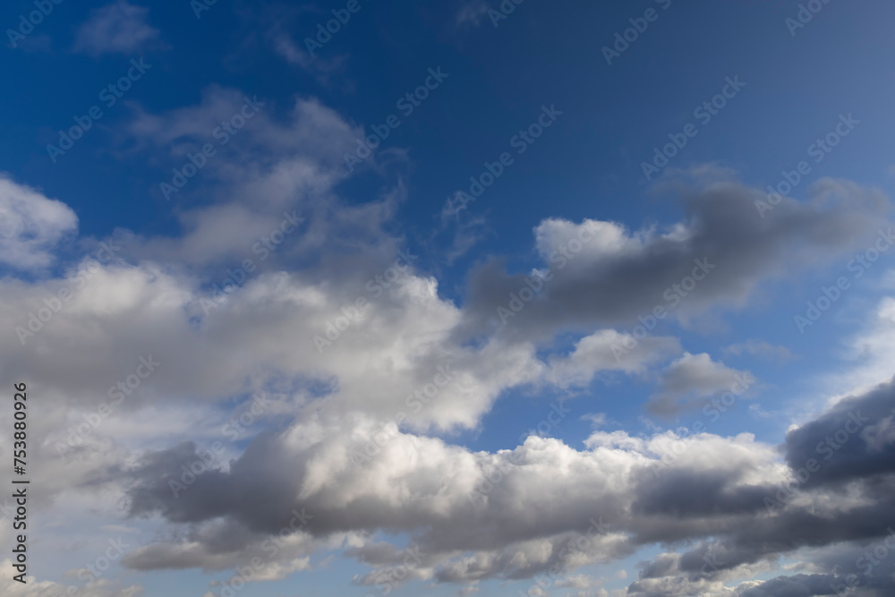 blue sky and clouds in windy weather