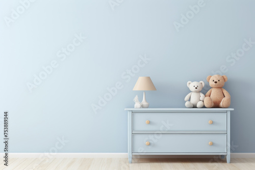 Cornflower blue empty wall mock up with a small cabinet and cuddly toys