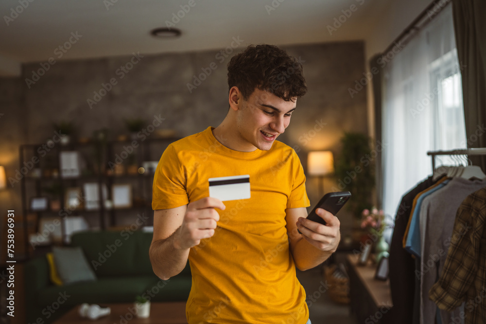 teenager young man at home use credit card shopping online teenager young man at home use credit card shopping online