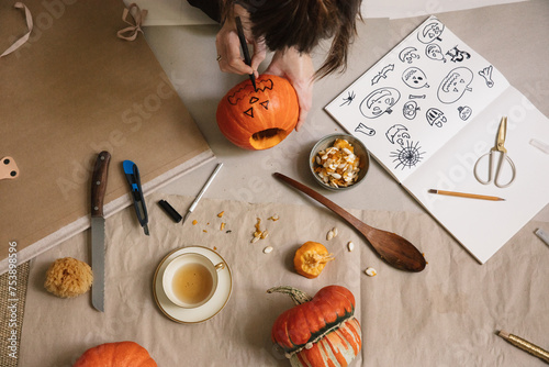 Preparation Of A Scary Pumpkin Lantern for Halloween photo