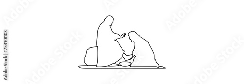 Jesus washes the feet of his disciple Peter with water.
