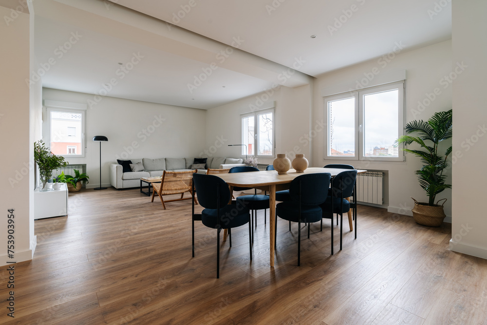 View of modern and cozy dining room with lots of natural light View of modern and cozy dining room with lots of natural light