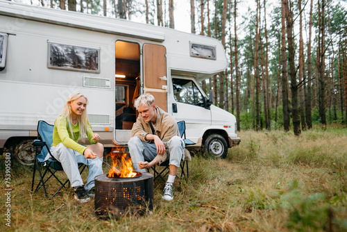 A man and a woman travel by RV photo