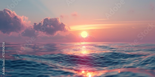 A beautiful sunset over the ocean with the sun reflecting on the water © kiimoshi