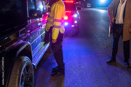 Photography The policeman stopped the criminals' car, the criminal is about to shoot the pol