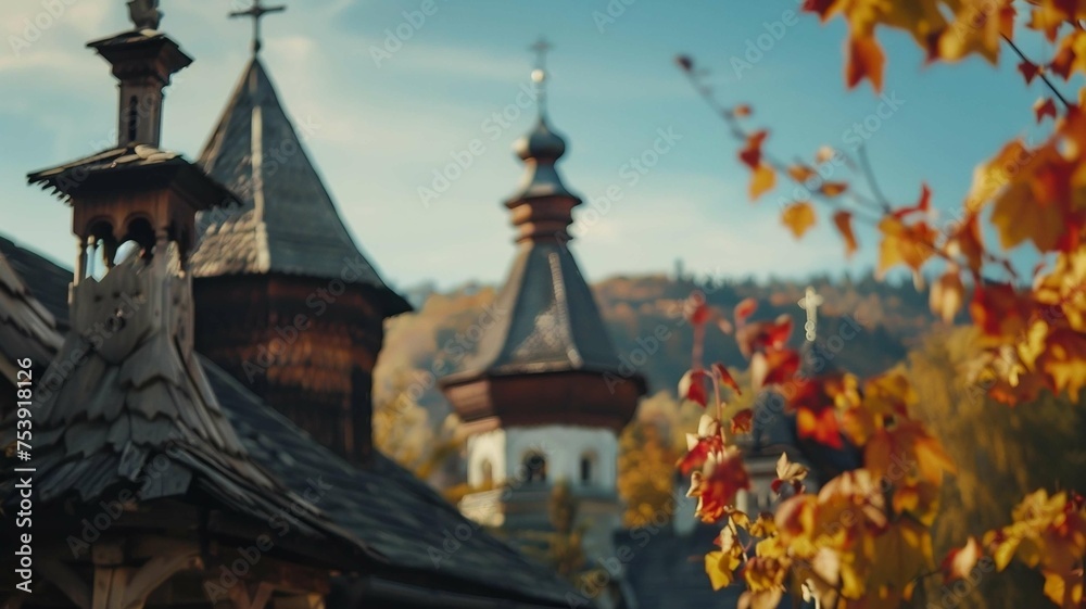 Ancient Church with Steeples and Autumn Leaves
