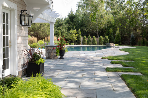Residential luxury Home outdoor terrace patio to swimming pool  photo