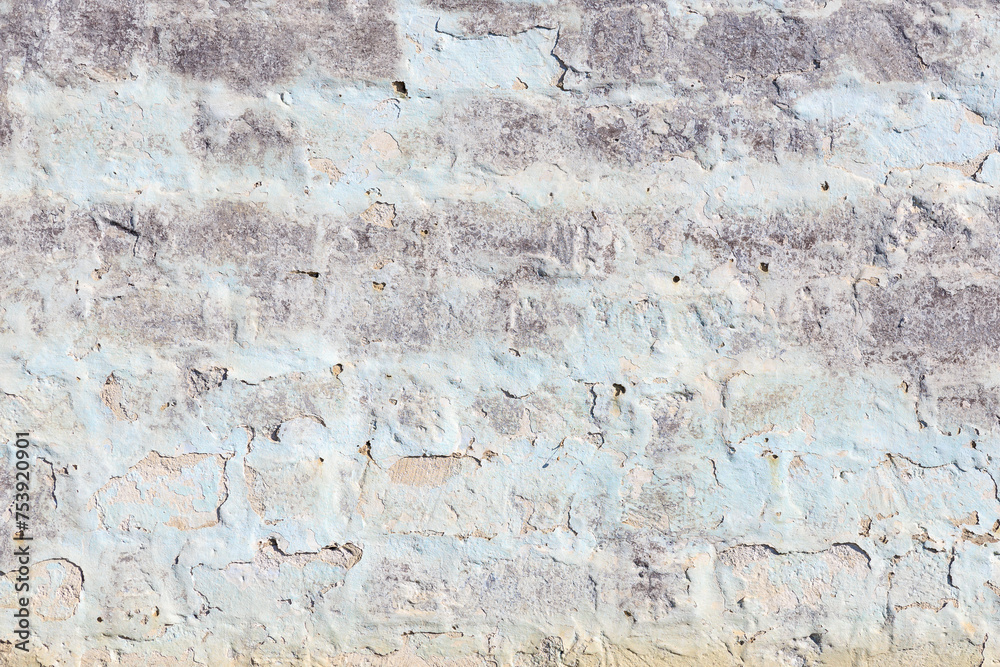 A wall with blue and white bricks A wall with blue and white bricks
