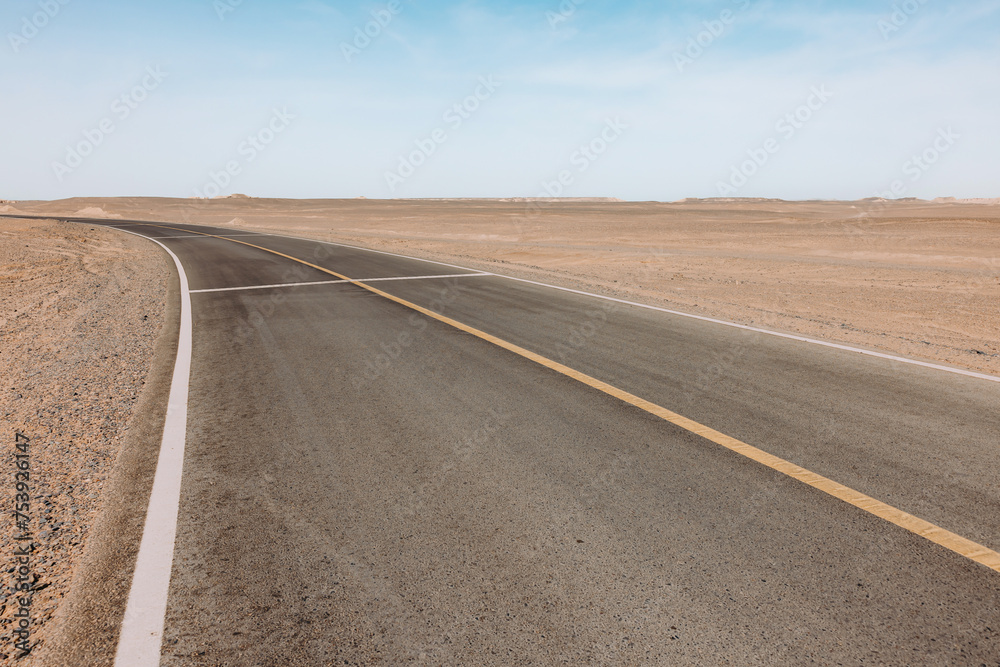 Desolate Desert Highway Stretching into Horizon Desolate Desert Highway Stretching into Horizon
