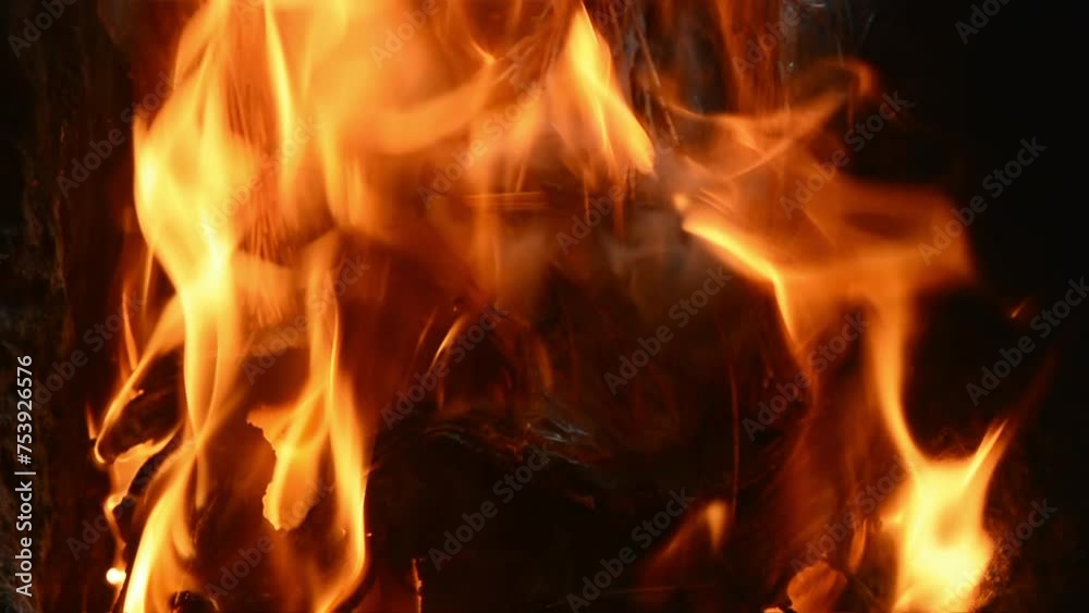 Close up of people burning plastic and paper waste