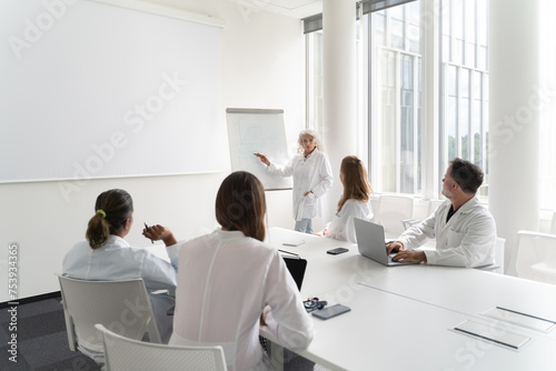 Meeting Of Researchers In Modern Conference Room photo