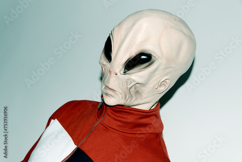 person wearing an alien mask photo