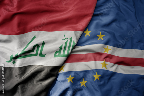 big waving national colorful flag of cape verde and national flag of iraq.