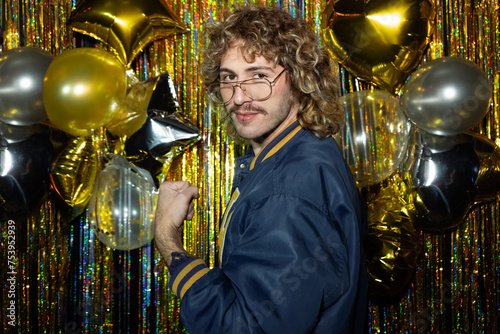 Young man in blue sports jacket and glasses photo