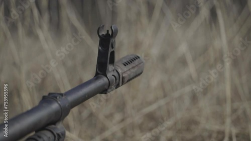 rifle shots. Close-up of the gun barrel.automatic assault weapon photo