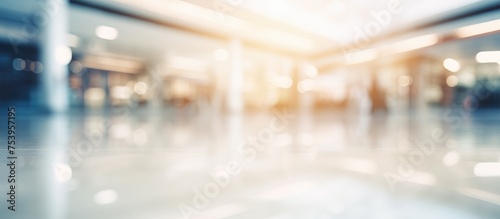A department store interior is captured in a blurry and defocused manner  showcasing an empty building devoid of any individuals or activity.