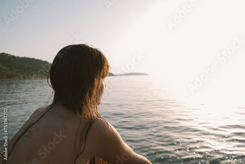 Sunkissed girl on the beach photo