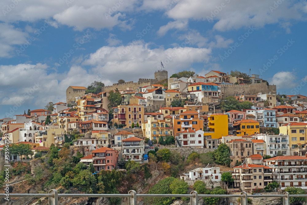 Residential houses with colorful facades on a hill in Greek city Kavala