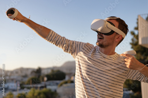 Guy in virtual reality helmet photo