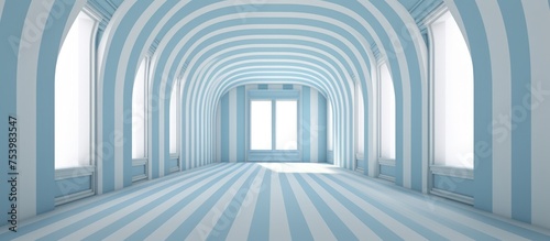 A long hallway with white and blue vertical stripes on the walls  creating a visually striking architectural background. The hallway appears empty  wide  and bright  with a clean and minimalist design