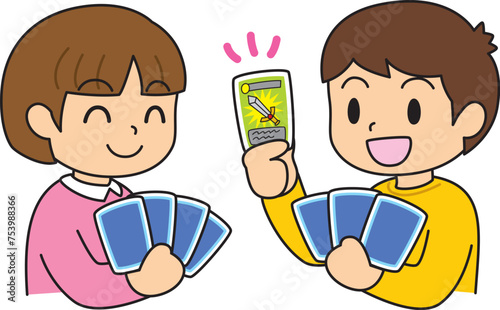 トレーディングカードで遊ぶ子供