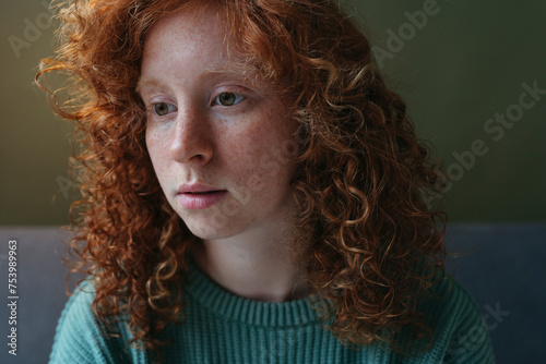 Portrait of red haired female. photo