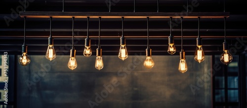 A cluster of black iron loft chandeliers adorned with Edison lamps dangles from the ceiling, illuminating the space with a warm glow. The scene showcases a modern interior design concept,
