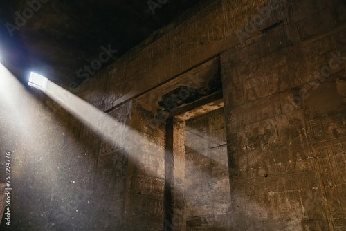 Rays of light illuminating the interior of the Egyptian temple of Edfu photo