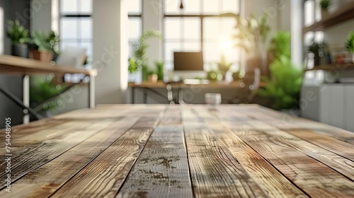 light wooden table top with blurred office scene on background products presentation concept 