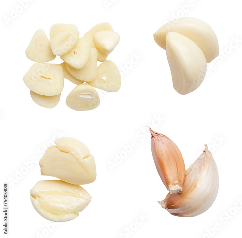 Top view set of peeled and unpeeled garlic cloves with slices in stack isolated on white background with clipping path