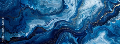 Mesmerizing blue and gold marbled abstract background, reminiscent of natural geological formations. photo