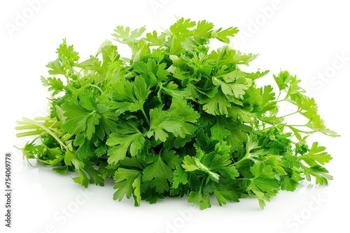 A bunch of fresh green parsley is piled on a white background. The parsley is fresh and green, and ready to be used in a recipe