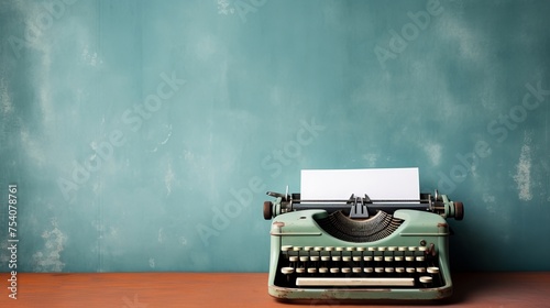 Blank page beside vintage typewriter.