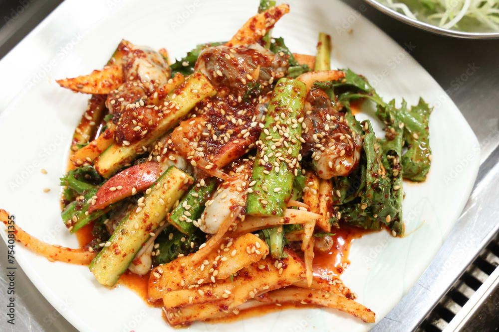 Korea style food. Raw Oyster spicy sauce Salad Korea style food. Raw Oyster spicy sauce Salad