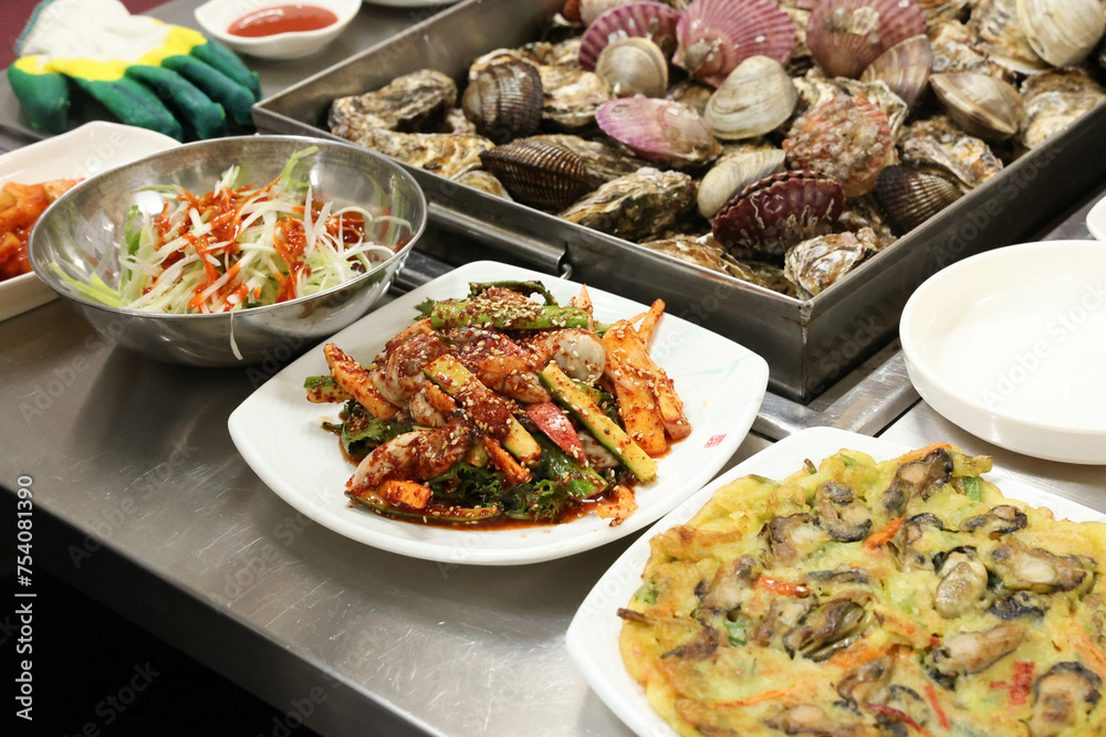 Korea style food. Raw Oyster spicy sauce Salad Korea style food. Raw Oyster spicy sauce Salad