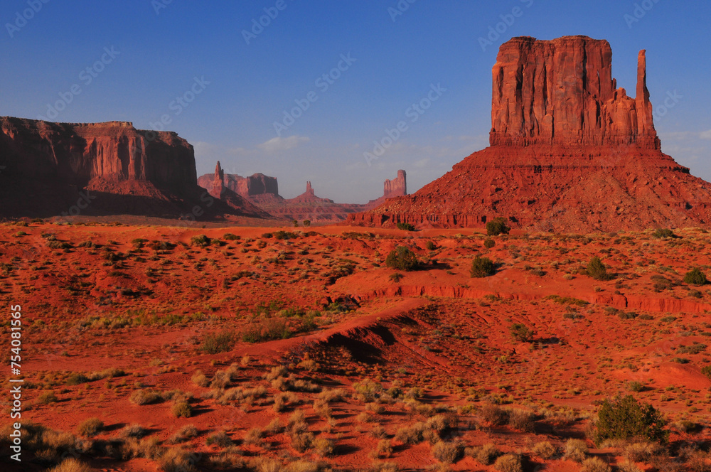 West Mitten Butte and other sandstone spires and mesas from the scenic drive inside the Monument Valley Navajo Tribal Park, Arizona, USA. West Mitten Butte and other sandstone spires and mesas from the scenic drive inside the Monument Valley Navajo Tribal Park, Arizona, USA.