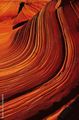 Detail of The Wave sandstone formation at sunrise, Coyote Buttes North, Vermilion Cliffs National Monument, Arizona, USA. photo