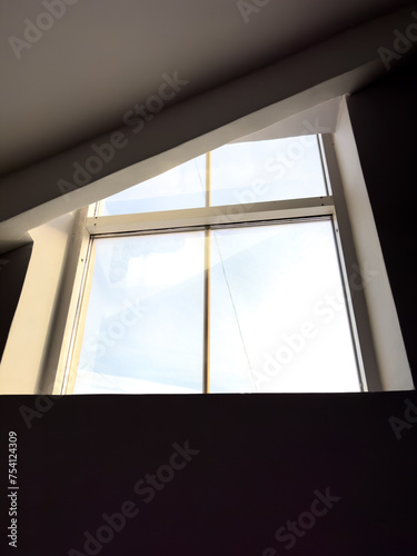 A sloping window in a building as a background