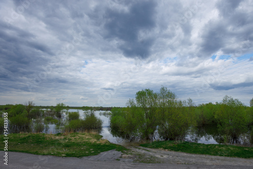 spring landscape with the river and blue sky