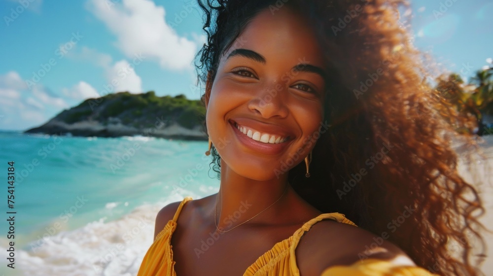 Young woman enjoying vacation taking selfie on tropical beach with clear blue sky and lush island in background. Summer travel and leisure. - obrazy, fototapety, plakaty 