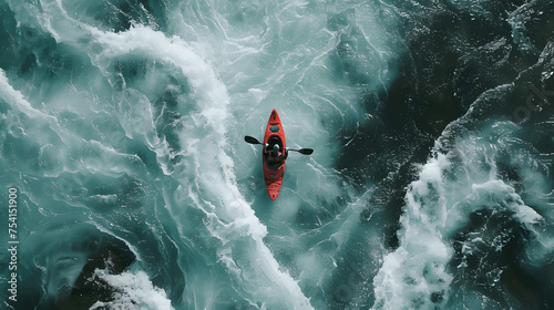 Top view of kayaker in rapid river waters © Matthias