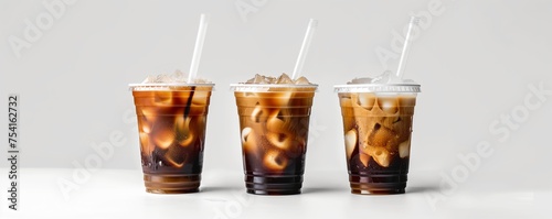 Obraz na płótnie 3 cups of iced coffee mockup with colored straws on a white background. w salonie
