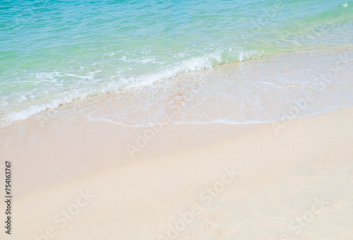 Travel Nature Concept  Sea Sand Background Blue Water at Coast Season Summer Tropical Ocean Beautiful Wave Seascape Vacation Smooth Wallpaper Island Outdoor Tropical Coast Sandy Nature Landscape.